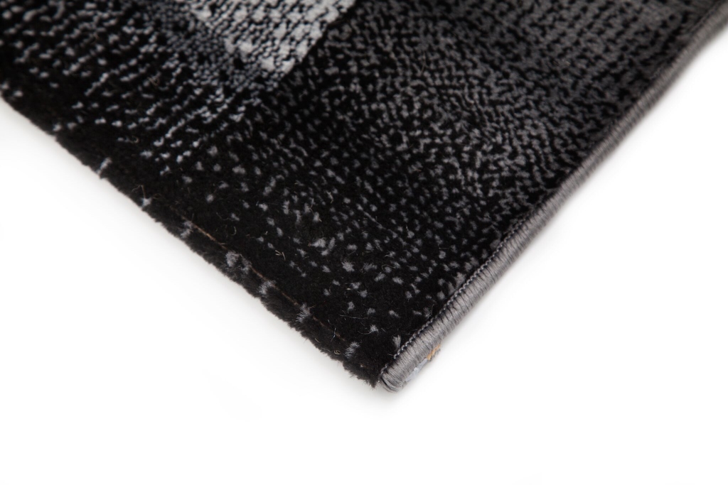 solano-patch-svart-modern-matta